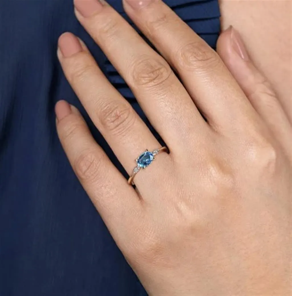 Gabriel & Co 14k Yellow Gold Oval Blue Topaz and Diamond Ring